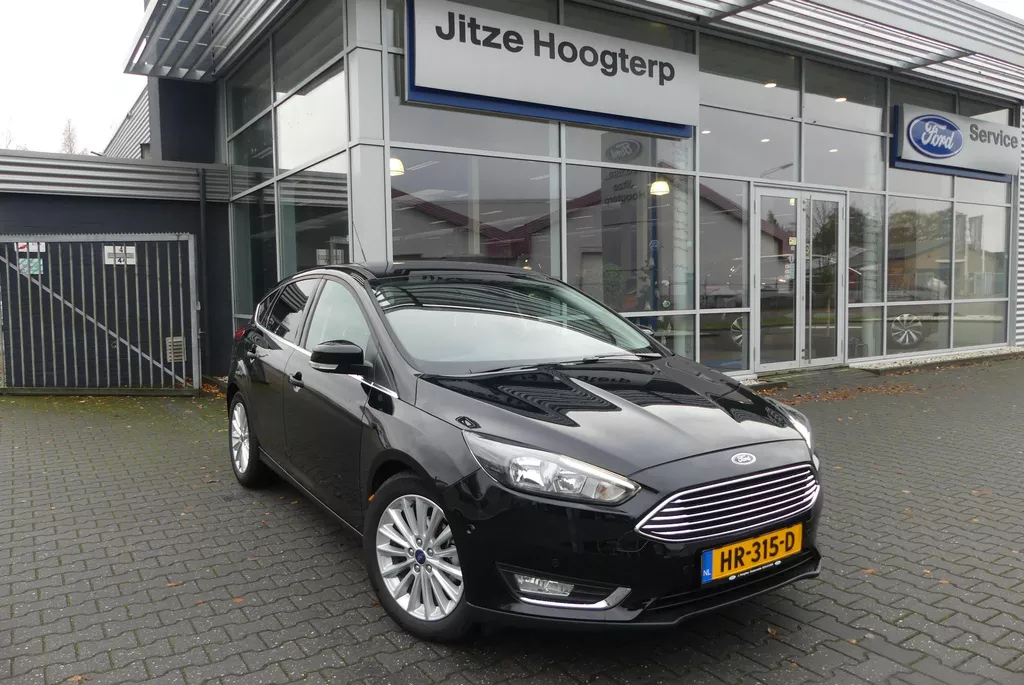 Ford Focus 1.0 Titanium Edition CRUISE, CLIMA, ELEKT. TREKHAAK (1.200KG), VOORRUITVERWARMING, PDC V&amp;A, 53.001KM
