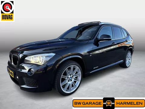 BMW X1 sDrive20i High Executive | Airco| Xenon | Bluetooth | Pano | Cruise control | leder | Navi | PDC | Stoelverwarming | M-Sport |