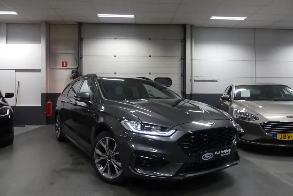 Ford Mondeo Wagon 2.0 IVCT HEV ST-Line X ELEKT. TREKHAAK (750KG), WINTER PACK, MEMORY SEAT, ADAPT. CRUISE, CLIMA, NAVI, APPLE CARPLAY/ANDROID AUTO, ELEKT. ACHTERKLEP, 83.780KM