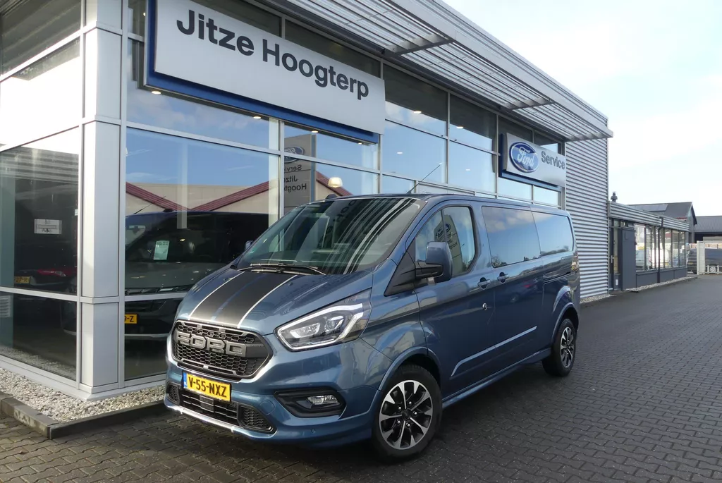 Ford Transit Custom 320 2.0 TDCI L2H1 Sport 5p., TREKHAAK (2.550KG), DUBBELE SCHUIFDEUR, WINTER PACK, CRUISE, AIRCO, CAMERA, PDC V&amp;A, APPLE CARPLAY/ANDROID AUTO, BI-XENON, LANE ASSIST, DAB, 47.576KM