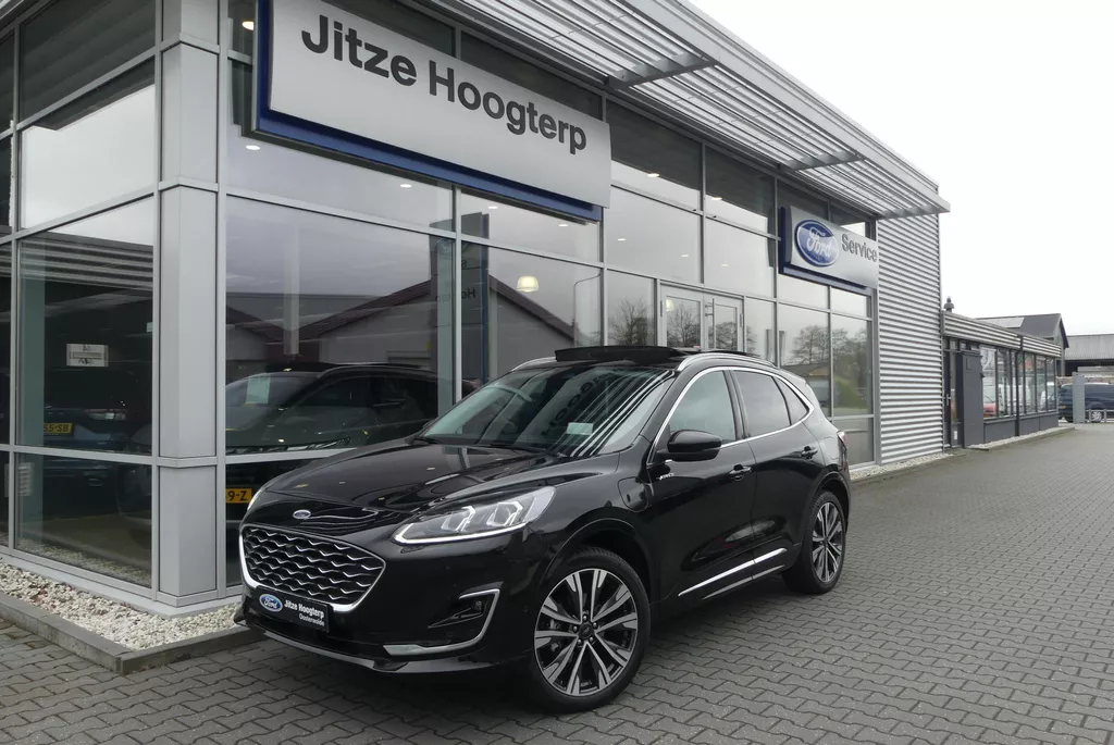Ford Kuga 2.5 PHEV Vignale ELEKT. TREKHAAK (1.500KG), PANO, HUD, MEMORY, WINTER PACK, ADAPT. CRUISE, CLIMA, NAVI, CAMERA V&amp;A, PDC V&amp;A, APPLE CARPLAY/ANDROID AUTO, BLIS, KEYLESS, B&amp;O, ELEKT. ACHTERKLEP, 38.765KM
