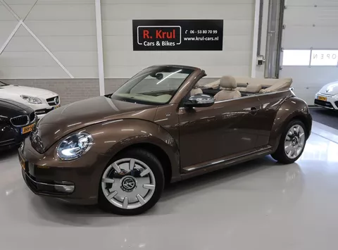 Volkswagen Beetle cabrio 1.2 TSI 70'S Leer 18 inch Beige kap Toffeebruin Xenon Airco-ecc Parkeersensoren 1e Eigenaar 70's uitvoering Nieuwstaat! dealer onderhouden windscherm