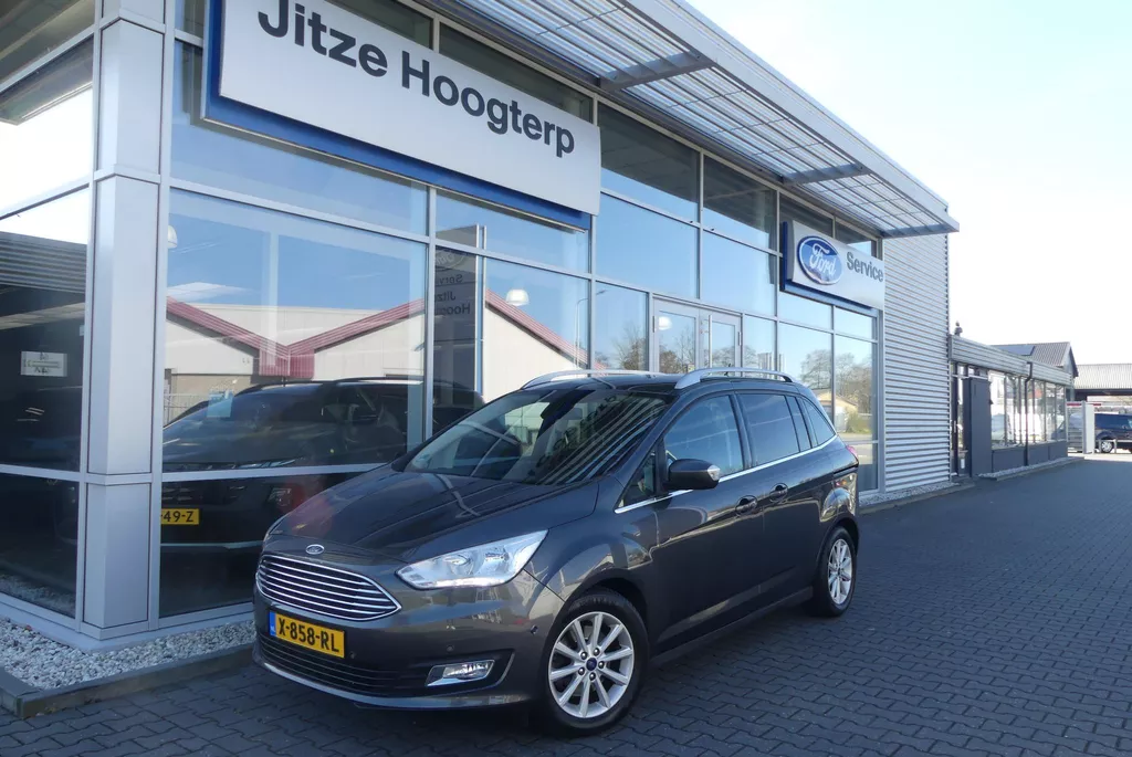 Ford Grand C-Max 1.5 Titanium 7p. TREKHAAK (1.300KG), WINTER PACK, CRUISE, CLIMA, NAVI, CAMERA, PDC V&amp;A, APPLE CARPLAY/ANDROID AUTO, KEYLESS, ELEKT. ACHTERKLEP, 119.145KM