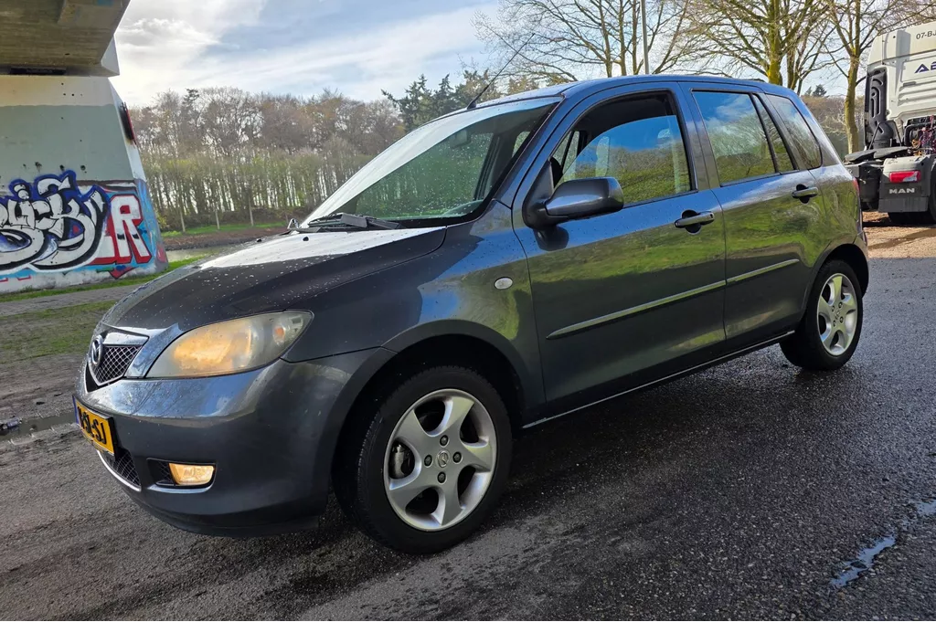 Mazda 2 1.4 Touring - APK t/m 09-03-2027 - Airco - NL Auto -