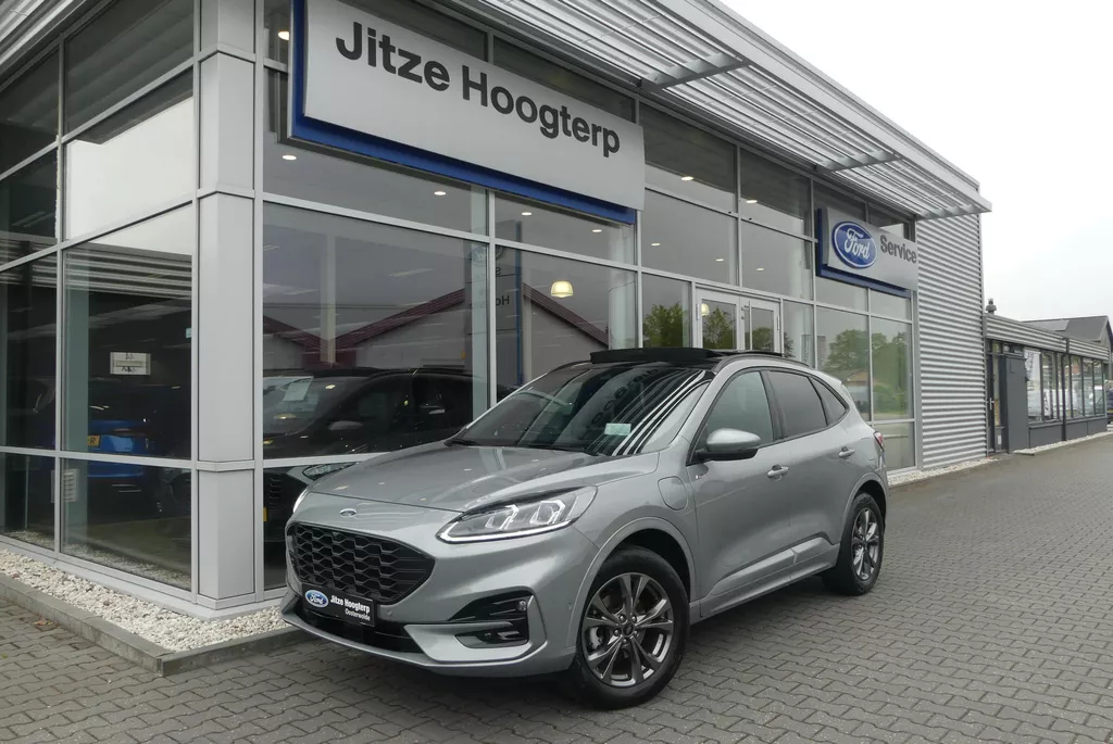 Ford Kuga 2.5 PHEV ST-Line X ELEKT. TREKHAAK (1.500KG), PANO, HUD, WINTER PACK, ADAPT. CRUISE, CLIMA, NAVI, CAMERA V&amp;A, PDC V&amp;A, APPLE CARPLAY/ANDROID AUTO, BLIS, KEYLESS, B&amp;O, ELEKT. ACHTERKLEP, ELEKT. STOEL, 19.427KM