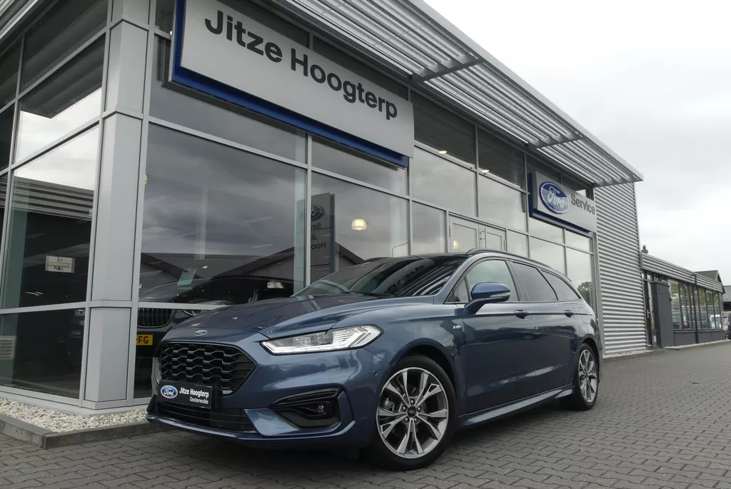 Ford Mondeo Wagon 2.0 IVCT HEV ST-Line WINTER PACK, MEMORY, ADAPT. CRUISE, CLIMA, NAVI, CAMERA, PDC V&amp;A, APPLE CARPLAY/ANDROID AUTO, BLIS, KEYLESS, ELEKT. ACHTERKLEP, ELEKT. PASSAGIERSSTOEL, 54.035KM