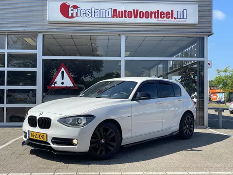 BMW 1-serie 114i Upgrade Edition /170 PK/Cruise/Airco/Lederen Sport interieur/Xenon/APK 07-2027/