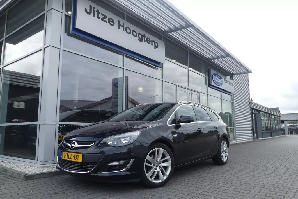 Opel Astra Sports Tourer 1.6 Turbo Cosmo TREKHAAK, LEER, WINTER PACK, CRUISE, CLIMA, NAVI, CAMERA, PDC V&amp;A, BLIS, DAB, ELEKT. RAMEN, 90.327KM