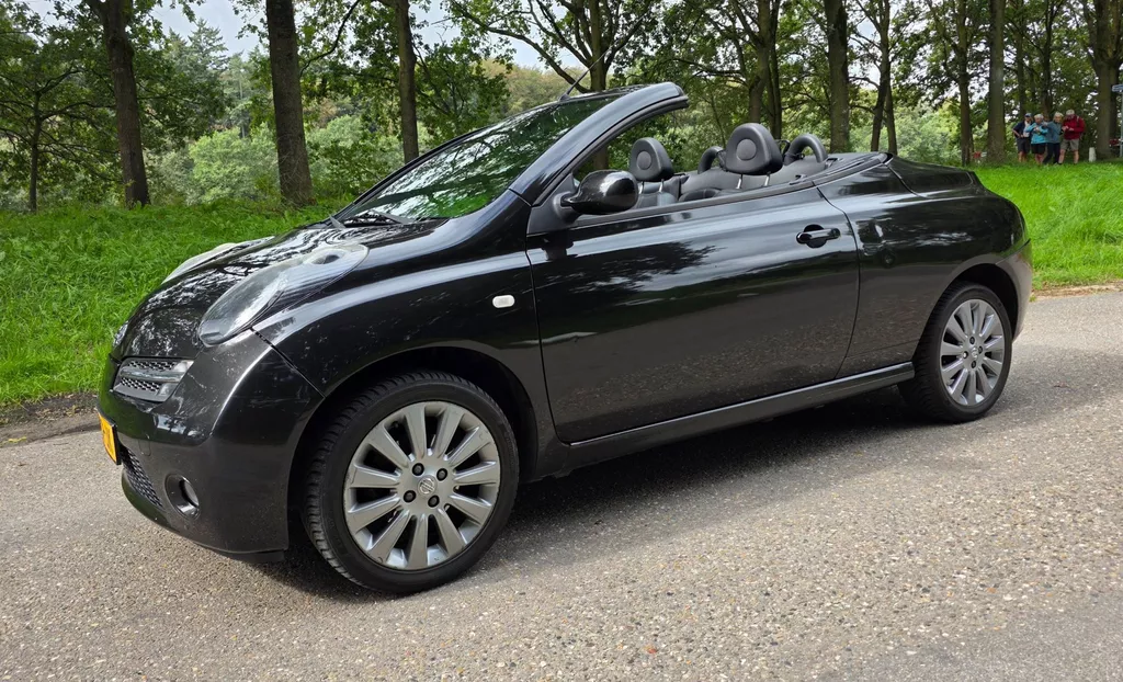 Nissan Micra C+C 1.6 Tekna Plus - Airco - APK T/M 16-05-2027