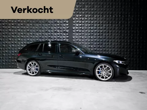 BMW 3-serie Touring 330e | 5 x M Perf. parts | M Tech. stoelen |DCC | H/K | Carbon | Pano | HUD | Ad. Li. | Memo | Amb. |