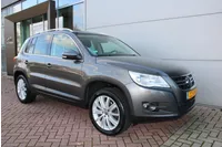 Volkswagen Tiguan 1.4 TSI 150pk Sport&Style Airco Camera Carplay Trekhaak Perfect onderhouden Foto