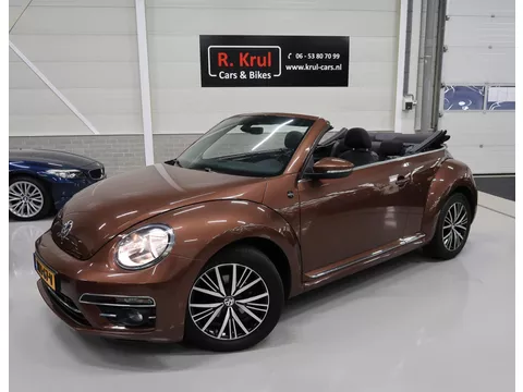 Volkswagen Beetle Cabriolet 1.2 TSI Sound 2018 Airco-ecc Navigatie App connect Stoelverwarming Windscherm 1e Eigenares Dealer onderhouden 17 inch Sportvelgen Zeer nette staat Dark Bronze metallic