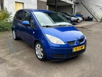 Mitsubishi Colt 1.5 d'Azur / Airco / Schuif-/kanteldak Foto
