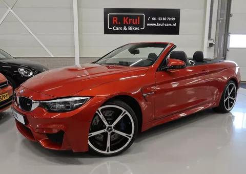 BMW 4-serie Cabrio M4 Sakhir Orange, BTW auto, 20 inch AC Schnitzer velgen Head-Up Navigatie Harman-Kardon Leer Nekverwarming Nieuwstaat! BMW dealer onderhouden