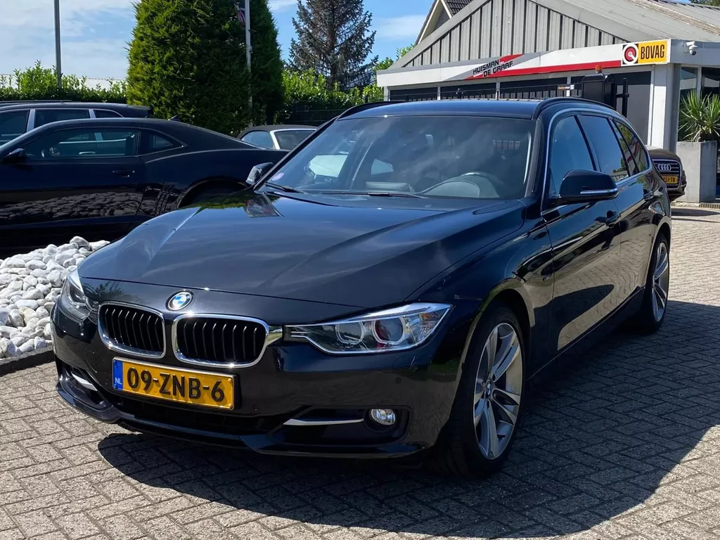BMW 3-serie 320i Touring High Exe Sportline Automaat 2013 Zwart
