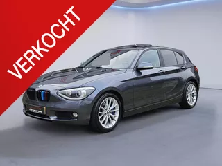 BMW 1-serie 125i Apple Carplay/Elektrisch schuifdak/M-Sport remklauwen/Sportstoelen/Xenon/Stoelverwarming/Cruise&amp;Clima control/ (MET GARANTIE*)