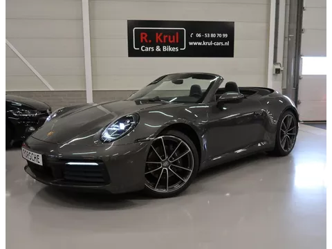 Porsche 911 Cabrio 3.0 Carrera 992 Bose 360 Camera Sportuitlaat PASM Sport-Chrono 21 inch Approved garantie 10/2026 Cabriolet 4 Nieuwe banden Groot onderhoud gehad PPF folie NIEUWSTAAT Flippers Stoelverkoeling LED PDLS
