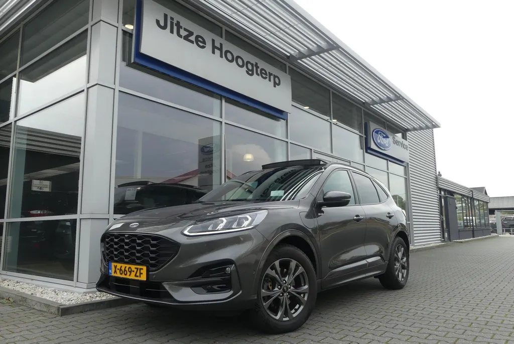 Ford Kuga 2.5 PHEV ST-Line X ELEKT. TREKHAAK, PANO, HUD, WINTER PACK, ADAPT. CRUISE, CLIMA, NAVI, CAMERA V&amp;A, PDC V&amp;A, APPLE CARPLAY/ANDROID AUTO, BLIS, KEYLESS, B&amp;O, ELEKT. ACHTERKLEP, ELEKT. STOEL, 92.189KM